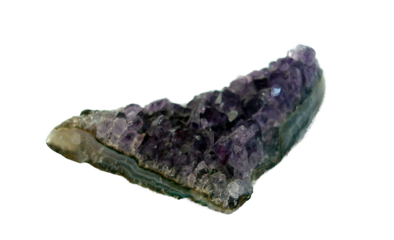 Transparent amethyst cutout over a gray checkerboard